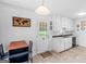 Bright kitchen with an adjacent dining area and door to the backyard at 71 Russell Rd, Mcdonough, GA 30252