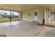 Covered patio with concrete floor and view of fenced backyard at 71 Russell Rd, Mcdonough, GA 30252