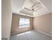 Bedroom with trey ceiling, ceiling fan and window for natural light at 159 Courtneys Ln, Fayetteville, GA 30215