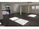 Open-concept living space with hardwood floors adjoining a kitchen with stainless appliances at 3122 Latona Sw Dr, Atlanta, GA 30354