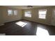 Well-lit living space with large windows and hardwood floors throughout at 3122 Latona Sw Dr, Atlanta, GA 30354