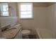 Bathroom with tile flooring and granite vanity at 619 Church Nw St, Atlanta, GA 30318