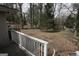 Expansive backyard features mature trees and a serene view from elevated patio area at 1923 Rosewood Rd, Decatur, GA 30032