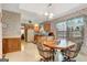 Bright eat-in kitchen area featuring a lovely window and a cozy table set at 110 Sycamore Bnd, Fayetteville, GA 30214