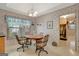 Bright dining area featuring large windows and neutral decor at 110 Sycamore Bnd, Fayetteville, GA 30214