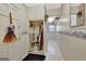 Hallway featuring storage, utility closet, and access to the laundry room at 110 Sycamore Bnd, Fayetteville, GA 30214