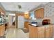 Well-lit kitchen with modern appliances, neutral-toned cabinets, and a functional layout at 110 Sycamore Bnd, Fayetteville, GA 30214