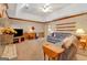 Spacious living room with plush seating, wood trim, and cozy lighting at 110 Sycamore Bnd, Fayetteville, GA 30214