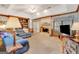 Cozy living room featuring a fireplace, built-in shelving, and comfortable seating at 110 Sycamore Bnd, Fayetteville, GA 30214