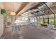 Bright sunroom with glass ceiling, multiple seating areas and natural light at 110 Sycamore Bnd, Fayetteville, GA 30214