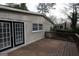 Spacious backyard deck with black trim door, and plenty of outdoor space at 2509 Appomattox Dr, Decatur, GA 30034