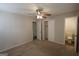 Comfortable bedroom with closet, ensuite bathroom, carpeted floors, and a ceiling fan at 2509 Appomattox Dr, Decatur, GA 30034