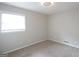 Cozy bedroom with neutral walls, plush carpet, and bright natural light at 2509 Appomattox Dr, Decatur, GA 30034