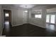 Dining area with modern lighting, vinyl flooring, and convenient access to multiple rooms at 2509 Appomattox Dr, Decatur, GA 30034