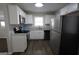 Modern kitchen with stainless steel appliances, granite countertops, and ample storage space at 2509 Appomattox Dr, Decatur, GA 30034