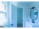 Bathroom with a vanity and mirror with a view of a shower and window at 2282 Tiffany Ct, Jonesboro, GA 30236