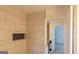 Tiled shower with a recessed shelf and a view into the bedroom area at 2282 Tiffany Ct, Jonesboro, GA 30236