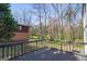 Exterior deck area with a view of the wooded back yard at 2282 Tiffany Ct, Jonesboro, GA 30236