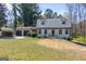 Charming two-story home with painted brick, dormer windows, and an attached two-car garage at 2282 Tiffany Ct, Jonesboro, GA 30236