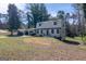 Charming two-story home with painted brick, dormer windows, and an attached two-car garage at 2282 Tiffany Ct, Jonesboro, GA 30236