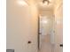 Hallway featuring fresh paint and modern lighting with an open view of the front door at 2282 Tiffany Ct, Jonesboro, GA 30236