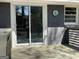 Backyard deck with sliding glass doors leading inside to the house at 1271 Sanders Dr, Lake City, GA 30260