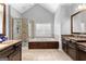 Spacious bathroom featuring a soaking tub and tiled shower at 1301 Blue Sky Ct, Peachtree City, GA 30269