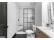 Modern bathroom with glass-enclosed shower and sleek vanity at 1301 Blue Sky Ct, Peachtree City, GA 30269