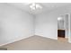Neutral bedroom boasts a view of the ensuite bathroom at 1301 Blue Sky Ct, Peachtree City, GA 30269
