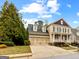 Charming two-story home featuring a two-car garage and a welcoming front porch, perfect for suburban living at 1301 Blue Sky Ct, Peachtree City, GA 30269