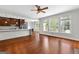 Spacious living space connecting to a kitchen with a bright view at 1301 Blue Sky Ct, Peachtree City, GA 30269