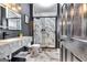 Stylish bathroom with marble shower, modern vanity, and elegant fixtures for a spa-like experience at 4450 Sterling Forest Dr, Decatur, GA 30034
