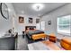 Stylish bedroom with a comfortable bed, modern decor, and abundant natural light at 4450 Sterling Forest Dr, Decatur, GA 30034