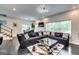 Modern living room with a plush sectional sofa, stylish coffee table, and abundant natural light at 4450 Sterling Forest Dr, Decatur, GA 30034