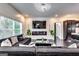 Contemporary living room featuring a cozy sectional, modern fireplace, and sleek entertainment setup at 4450 Sterling Forest Dr, Decatur, GA 30034