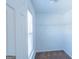 Walk-in closet features neutral walls, carpeted floors, shelves and a window at 8030 Snapwell Dr, Fairburn, GA 30213