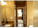 Bathroom with granite counters and view to bedroom at 1109 Norsworthy Ml, Hampton, GA 30228
