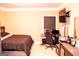 Comfortable bedroom with bed, TV and desk for an inviting and useful space at 1109 Norsworthy Ml, Hampton, GA 30228