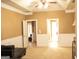 Main bedroom featuring a seating area and great trim and views to other parts of the house at 1109 Norsworthy Ml, Hampton, GA 30228