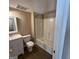 Bathroom features modern vanity, toilet, and shower/tub combo, providing functionality and style in a compact design at 125 Mcintosh Estates Dr, Sharpsburg, GA 30277