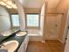 Primary bathroom boasts double sinks, large soaking tub, and a separate shower at 125 Mcintosh Estates Dr, Sharpsburg, GA 30277