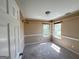Cozy bedroom with carpet, two windows, and neutral paint, offering natural light at 125 Mcintosh Estates Dr, Sharpsburg, GA 30277