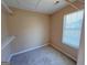 Carpeted walk-in closet with an overhead light and white wire shelving at 125 Mcintosh Estates Dr, Sharpsburg, GA 30277