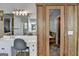 Bathroom with dual vanity, wood sauna, and view of the spacious room at 4852 Jacobs Cove Pt, Buford, GA 30519