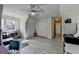 Bonus room with desk, chair and guitar, offers flexible space for work or play at 4852 Jacobs Cove Pt, Buford, GA 30519