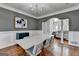 Spacious dining room featuring hardwood floors and elegant lighting at 4852 Jacobs Cove Pt, Buford, GA 30519