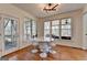 Eat-in kitchen with access to a screened in porch and lots of natural light at 4852 Jacobs Cove Pt, Buford, GA 30519