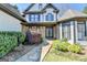 Charming home featuring stone accents, manicured landscaping and a stone walkway at 4852 Jacobs Cove Pt, Buford, GA 30519