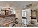 Open basement kitchen and dining area, perfect for entertaining Gathering and friends at 4852 Jacobs Cove Pt, Buford, GA 30519