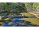 Scenic view of a wooden dock with a pagoda on the water at 4852 Jacobs Cove Pt, Buford, GA 30519